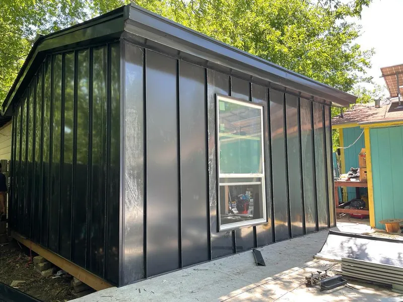 Black standing seam metal wall panels for Roof Inspection in Springboro