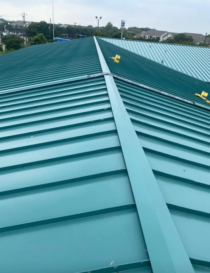 Green commercial metal roof ridge and valley for Metal Roof Repair in Springboro