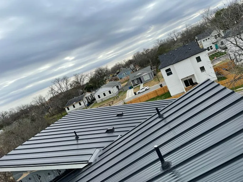Standing seam metal roof panels with vents for Skylight Repair in Springboro